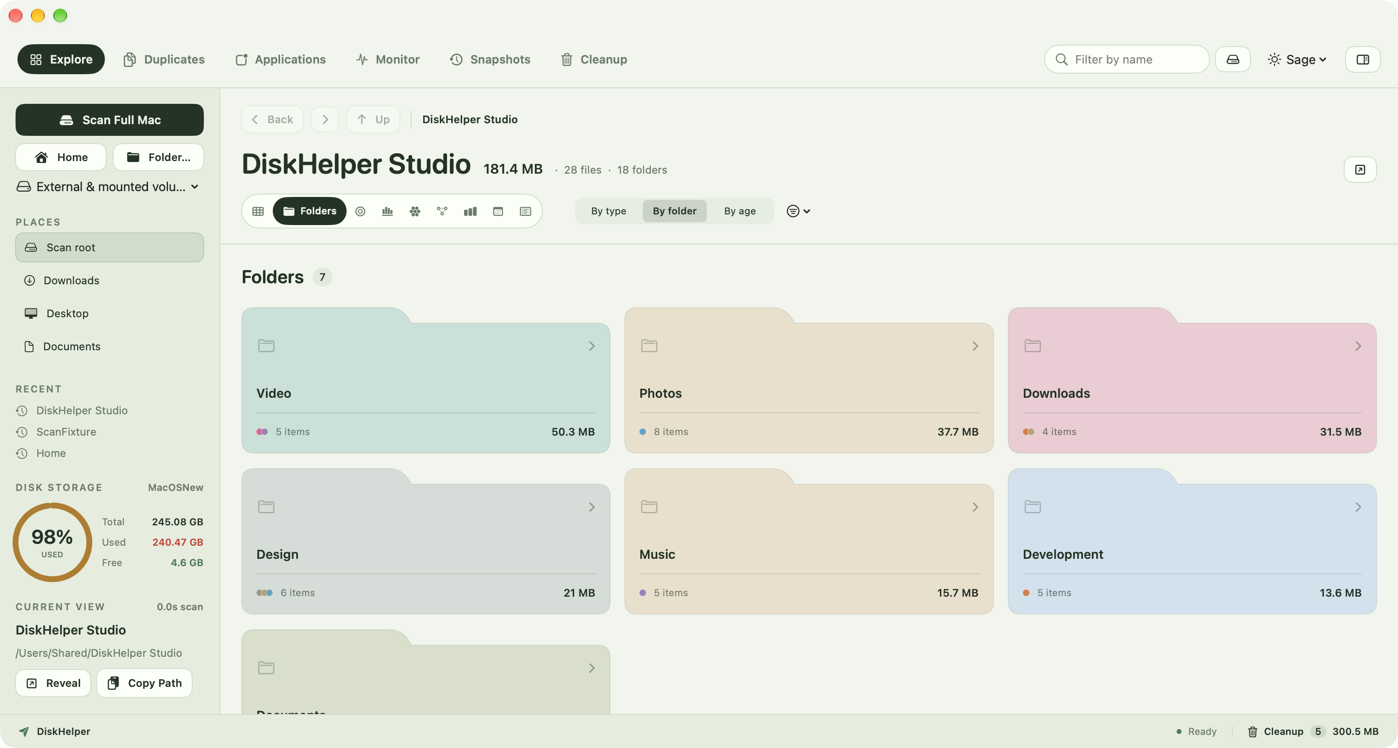 DiskHelper folder grid showing example folders as pastel cards with file sizes.